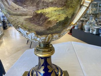 A pair of massive French S&egrave;vres-style vases with gilt bronze mounts, signed Desprez, 19th C.