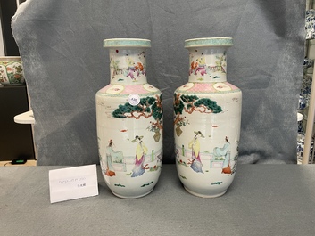 A pair of Chinese famille rose rouleau vases with immortals, 19/20th C.