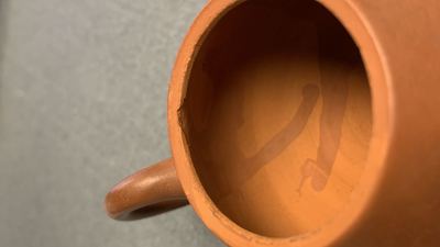 Five Chinese Yixing stoneware teapots and covers, 19th C.