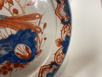 A Dutch Delft dor&eacute; 'peacock' plate, 18th C.