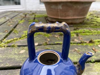 A Chinese gilt-decorated blue-ground teapot and cover, Qianlong mark and of the period