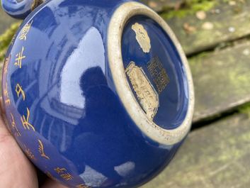 A Chinese gilt-decorated blue-ground teapot and cover, Qianlong mark and of the period