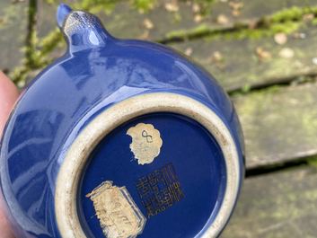 A Chinese gilt-decorated blue-ground teapot and cover, Qianlong mark and of the period