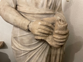 A Roman marble statue of a philosopher holding a parchment roll, ca. 2nd C.