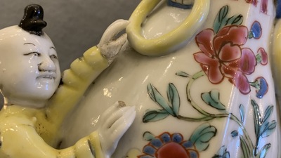 A Chinese blue and white bowl, a figure of a boy and a famille rose wall vase, Kangxi/Qianlong