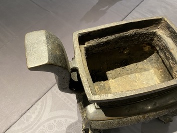 A large Chinese bronze censer and cover, Ming