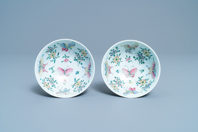 A pair of Chinese famille rose rice grain pattern 'butterfly' bowls, Qianlong mark, 19th C.