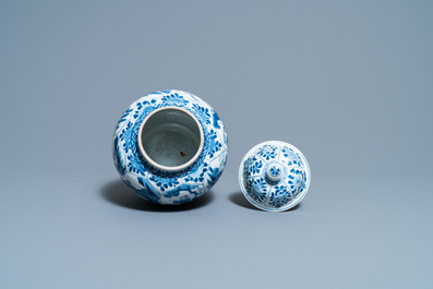 A Chinese blue and white 'horseriders' vase and cover, Kangxi