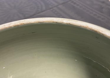 A Chinese celadon-glazed tripod censer with incised underglaze design, Kangxi