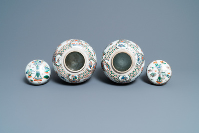 A pair of Chinese famille verte jars and covers, Kangxi