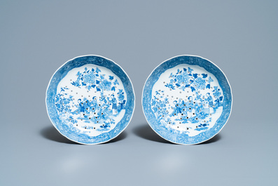 A pair of Chinese blue and white strainer dishes with ladies in a garden, Qianlong