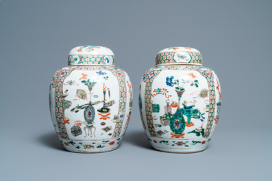 A pair of Chinese famille verte jars and covers, Kangxi