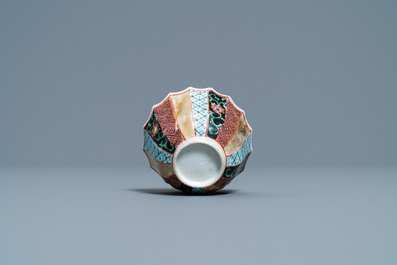 A lobed Chinese famille rose 'fishermen' cup and saucer, Yongzheng