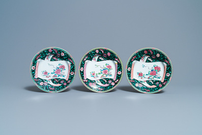 Eighteen Chinese famille rose plates with floral sprigs on scrolls, Yongzheng