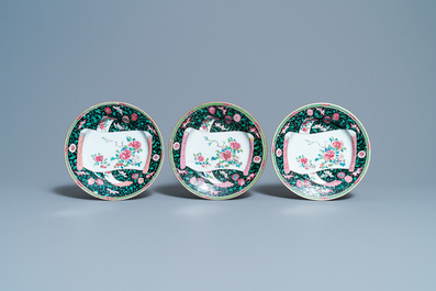 Eighteen Chinese famille rose plates with floral sprigs on scrolls, Yongzheng