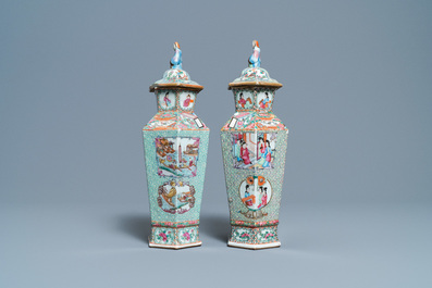 Two Chinese hexagonal Canton famille rose vases and covers, 19th C.