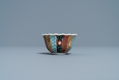 A lobed Chinese famille rose 'fishermen' cup and saucer, Yongzheng