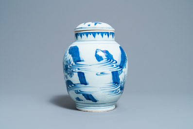 A Chinese blue and white jar and cover with figures in a landscape, Transitional period