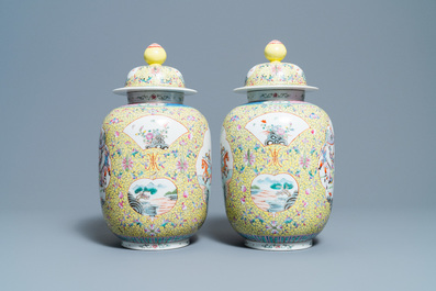 A pair of Chinese famille rose yellow-ground vases and covers, Guangxu mark, Republic