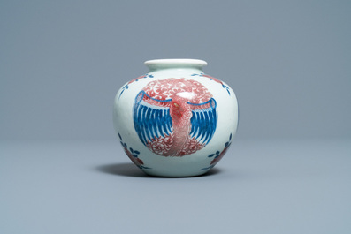 A Chinese blue, white and copper-red 'phoenixes' water pot, Kangxi mark, 19th C.