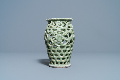 A Chinese reticulated monochrome Longquan celadon brush pot, Ming