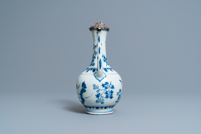 A Chinese blue and white silver-mounted ewer and cover, Transitional period