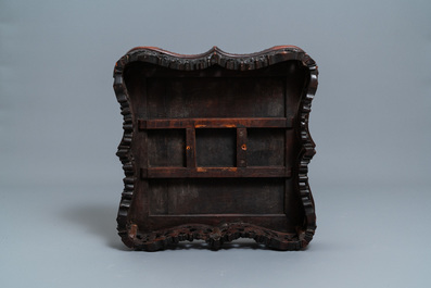 A Chinese carved wooden side table with marble chessboard top, 19th C.