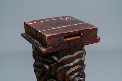 A Chinese carved wooden side table with marble chessboard top, 19th C.