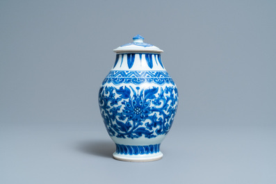 A Chinese blue and white 'lotus scroll' jar and cover, Transitional period