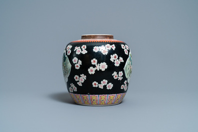 A Chinese black-ground famille rose jar, 19th C.