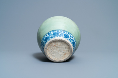 A Chinese celadon-ground and blue and white 'lotus scroll' jar, Ming