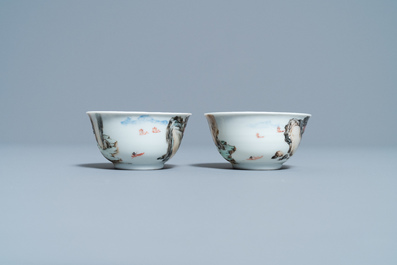 A fine Chinese 'landscape' teapot and a pair of cups and saucers, Yongzheng