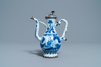 A Chinese blue and white silver-mounted ewer and cover, Transitional period