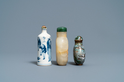 Three Chinese chalcedony, cloisonn&eacute; and porcelain snuff bottles, 19th C.