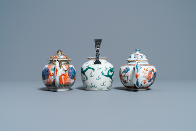 A Chinese famille verte teapot, an Imari-style teapot and an Amsterdam bont teapot, Kangxi and 19th C.