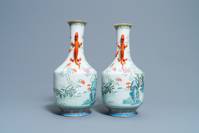 A pair of Chinese famille rose 'floral scenery' vases, Jiaqing mark, 19th C.