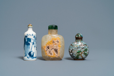 Three Chinese chalcedony, cloisonn&eacute; and porcelain snuff bottles, 19th C.