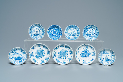 Sixteen Chinese blue and white saucers and fourteen cups, Kangxi