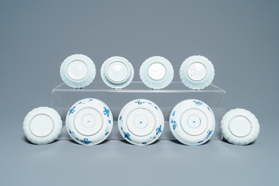 Sixteen Chinese blue and white saucers and fourteen cups, Kangxi