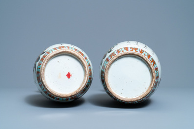 A pair of Chinese blue and white covered jars and a pair of famille rose vases, 19th C.