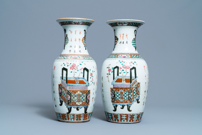 A pair of Chinese blue and white covered jars and a pair of famille rose vases, 19th C.