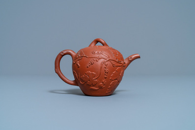 A Chinese Yixing stoneware teapot with squirrels among grapevines, Kangxi