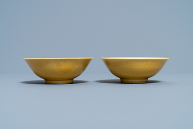 A pair of Chinese yellow-glazed bowls, Jiajing mark and of the period