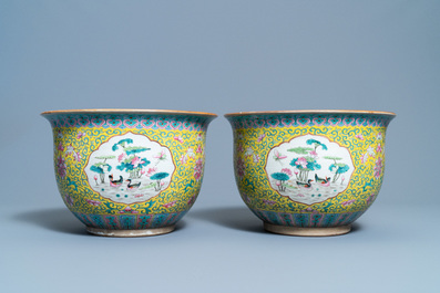 A pair of Chinese famille rose jardini&egrave;res on stands, 19th C.