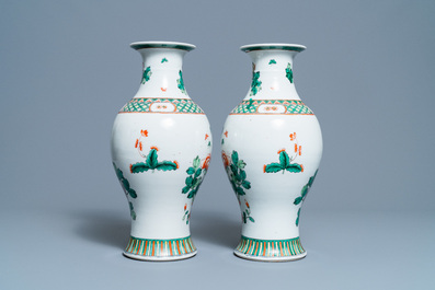 A pair of Chinese famille verte vases with birds among blossoming branches, Republic