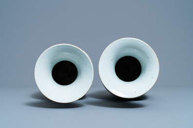 A pair of Chinese blue and white covered jars and a pair of famille rose vases, 19th C.