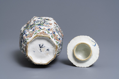 A Dutch Delft cashmere palette vase and cover, 18th C.