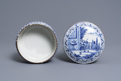 A round Dutch Delft blue and white box and cover with tobacco harvesting scenes, 18th C.