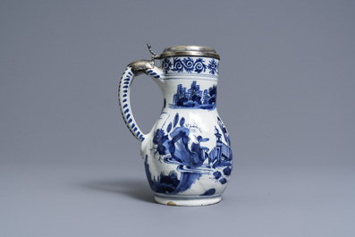 A silver-mounted Dutch Delft blue and white chinoiserie jug, 17th C.