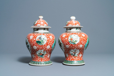 A pair of Chinese famille verte vases and covers, 19/20th C.